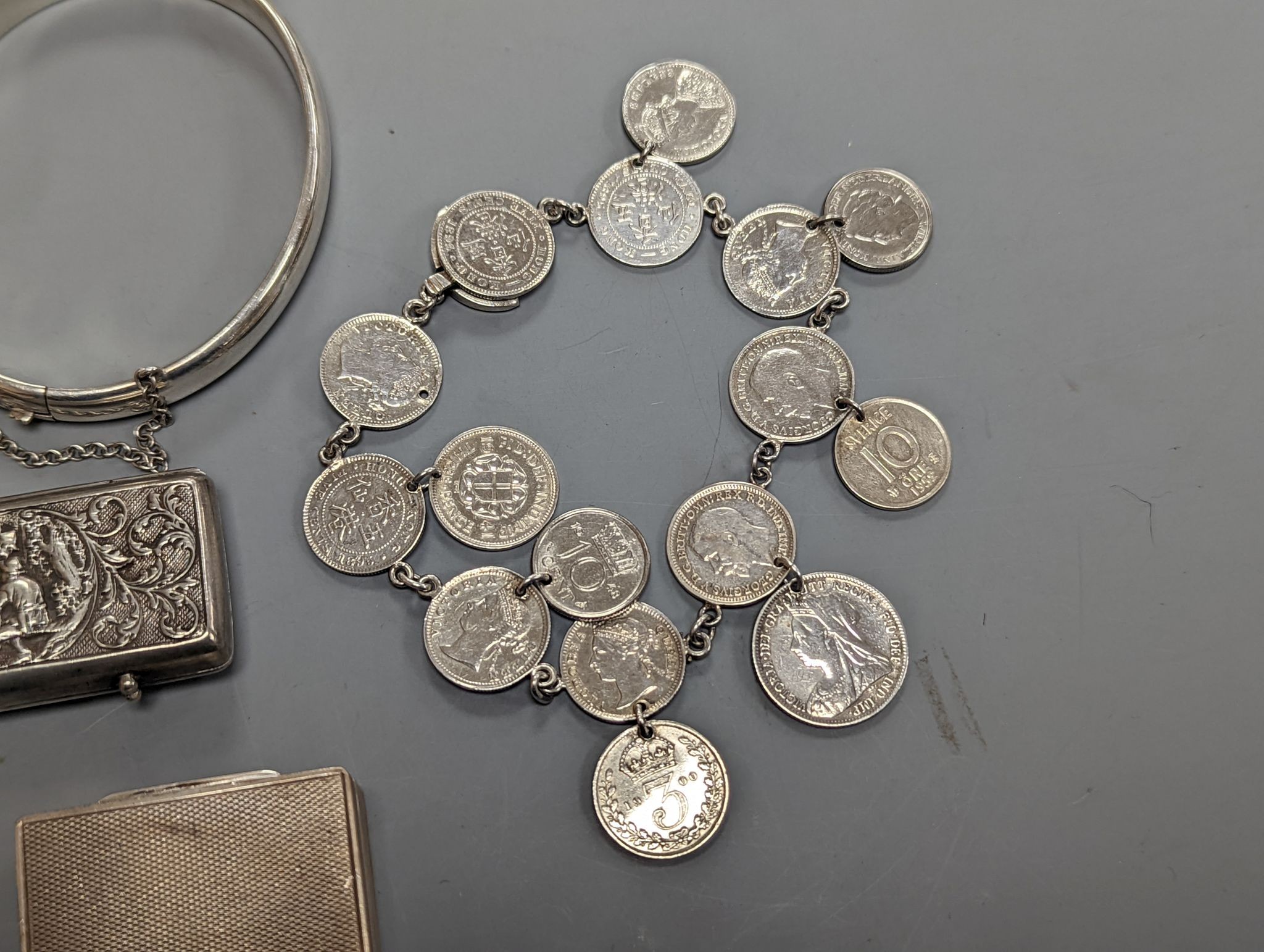 Two Austro Hungarian white metal snuff boxes, a bracelet and coin bracelet.